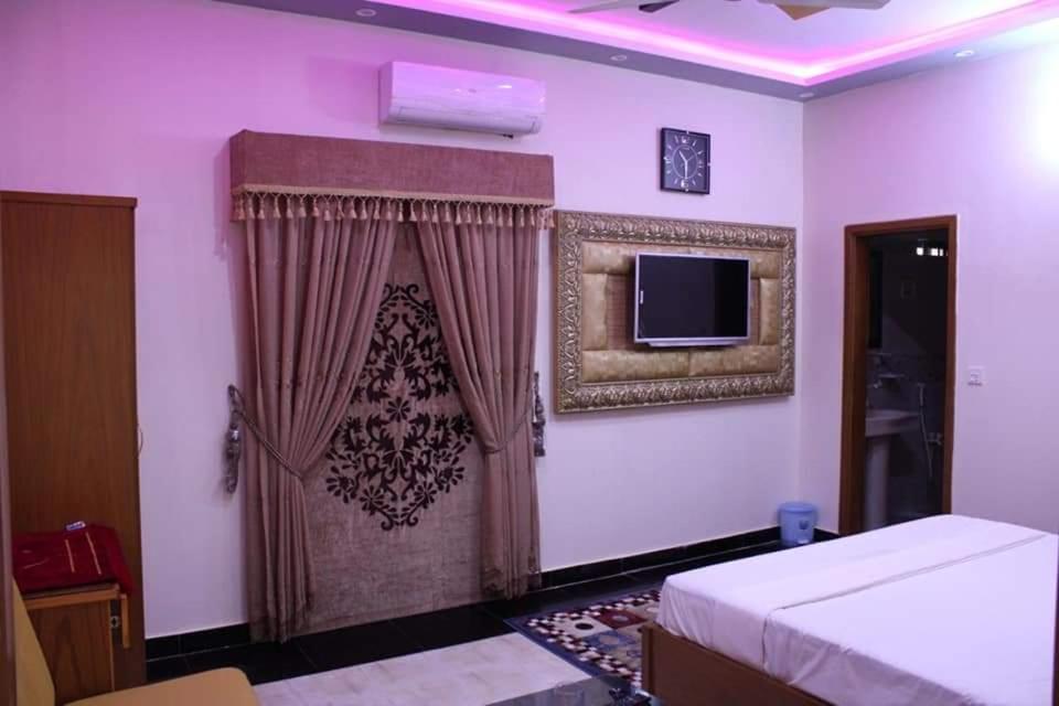 Hotel Clifton Inn Karacsi Kültér fotó
